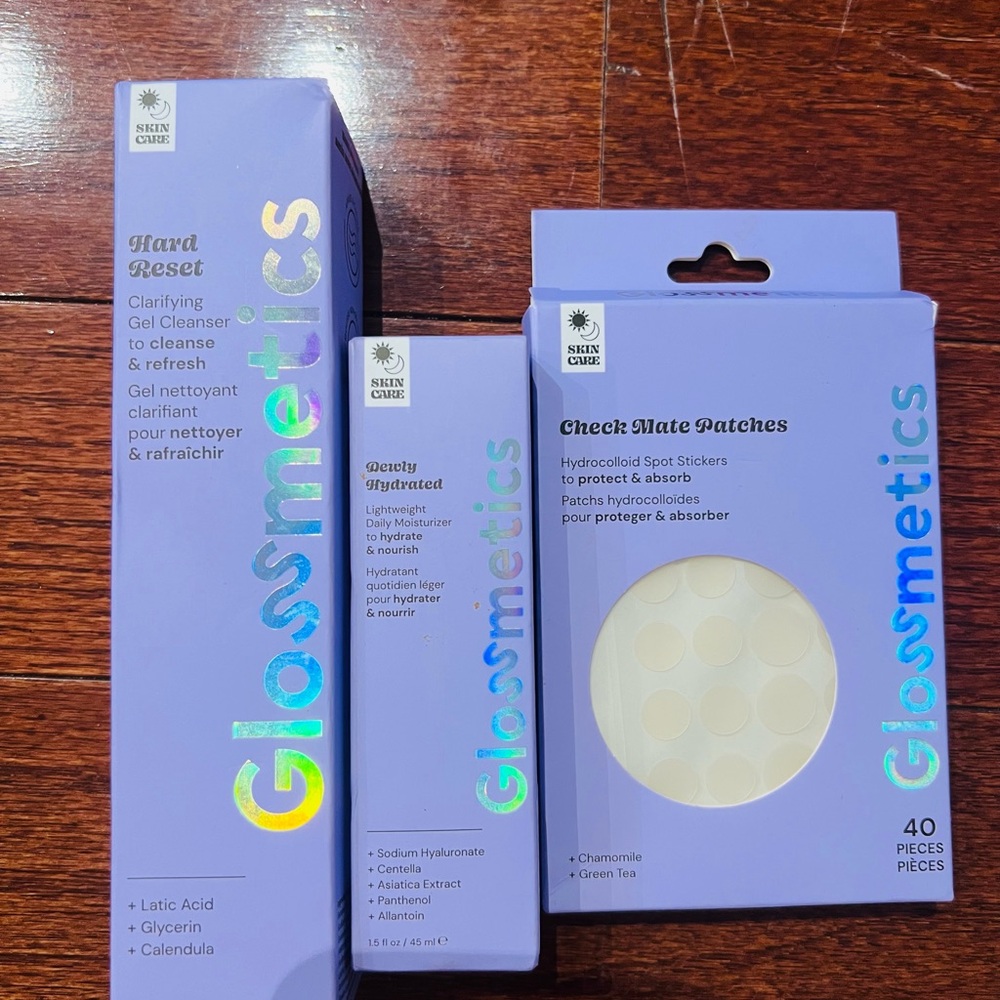Glossmetics clarifying gel cleanser, hydrating gel, and hydrocolloid patches.